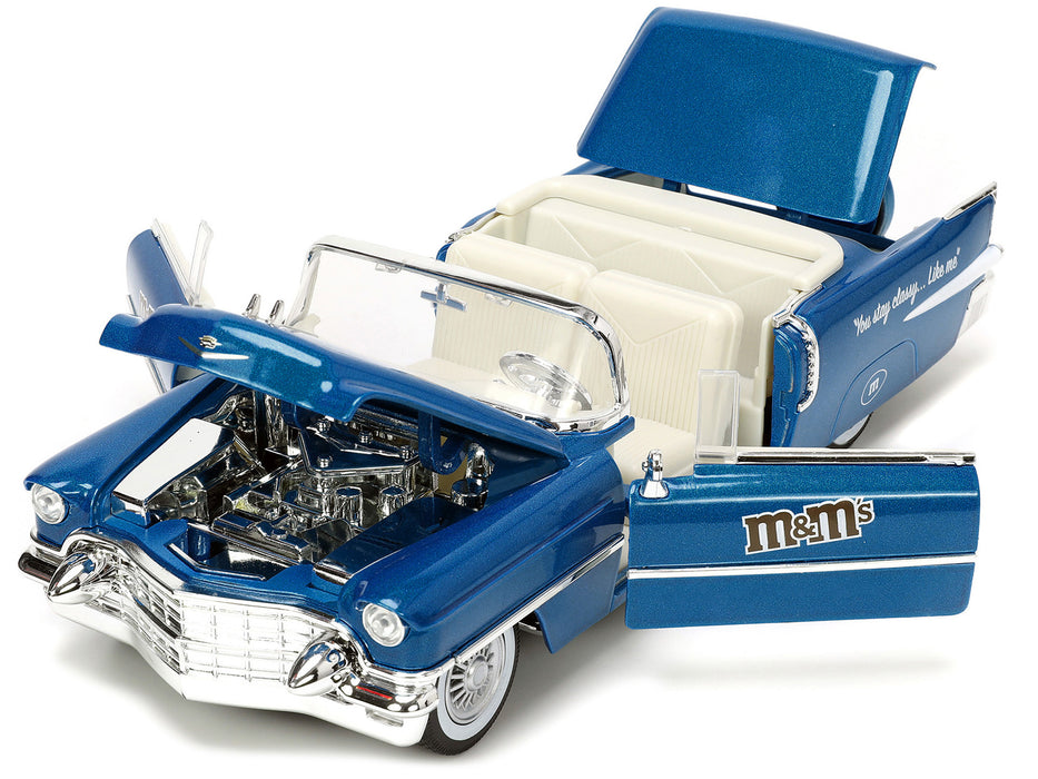 1956 Cadillac Eldorado Convertible Blue Metallic with Cream Interior "Stay Classy" and Blue M&M Diecast Figure "M&M's" "Hollywood Rides" Series 1/24 Diecast Model Car by Jada