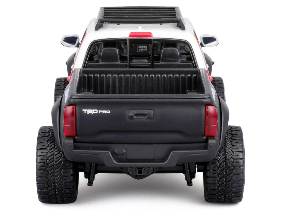 2023 Toyota Tacoma TRD PRO Off Road Pickup Truck White with Graphics and Roof Rack "Maisto Design" Series 1/27 Diecast Model Car Maisto