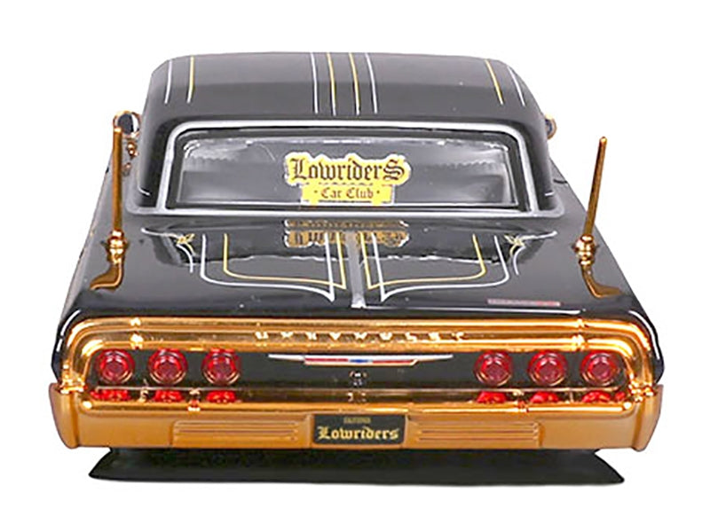 1964 Chevrolet Impala SS Lowrider Black Metallic with Gold Graphics and Gray Interior "Lowriders" "Maisto Design" Series 1/26 Diecast Model Car by Maisto