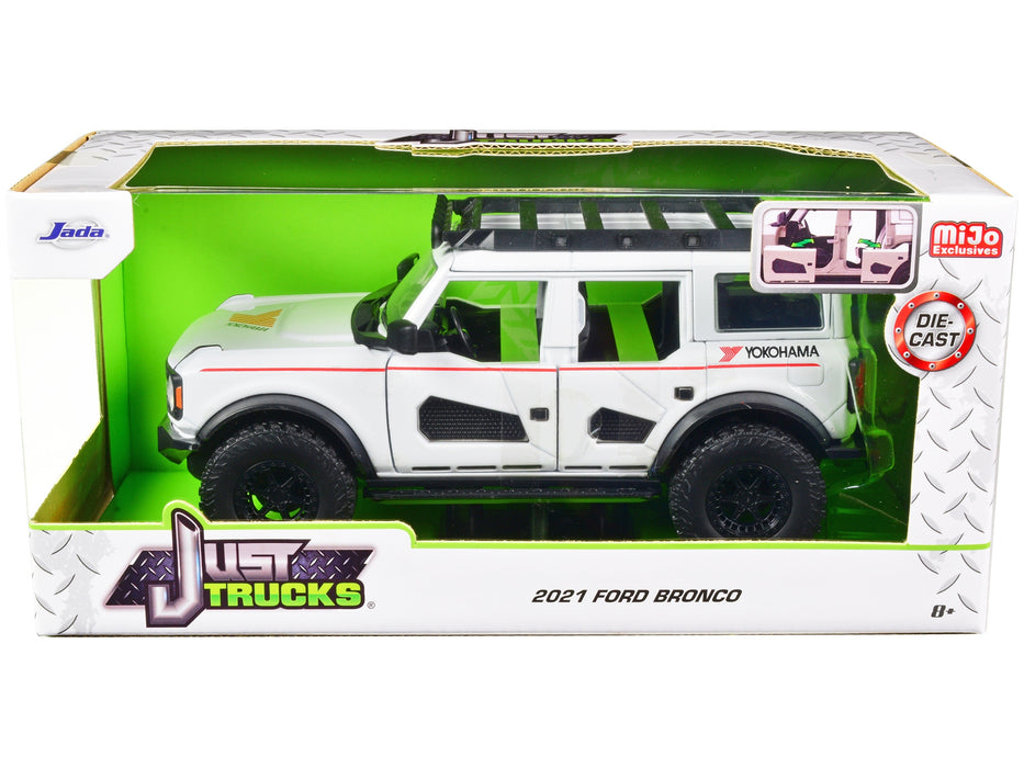 2021 Ford Bronco White with Red Stripes and Roof Rack "Yokohama Tires" "Just Trucks" Series 1/24 Diecast Model Car by Jada