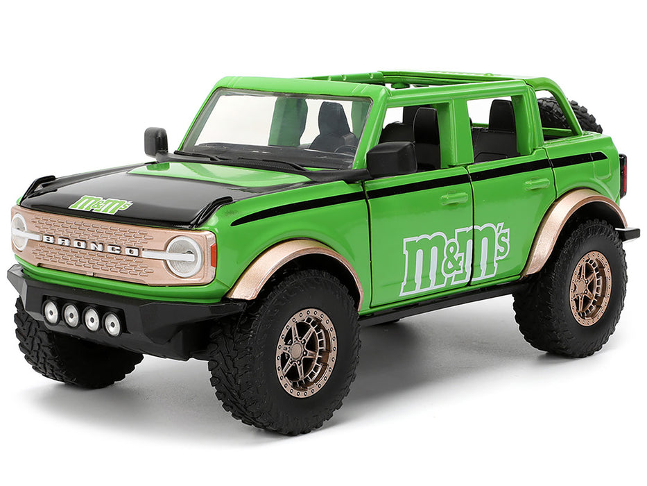2021 Ford Bronco Green with Black Stripes and Green M&M's Diecast Figure "Hollywood Rides" Series 1/24 Diecast Model Car by Jada