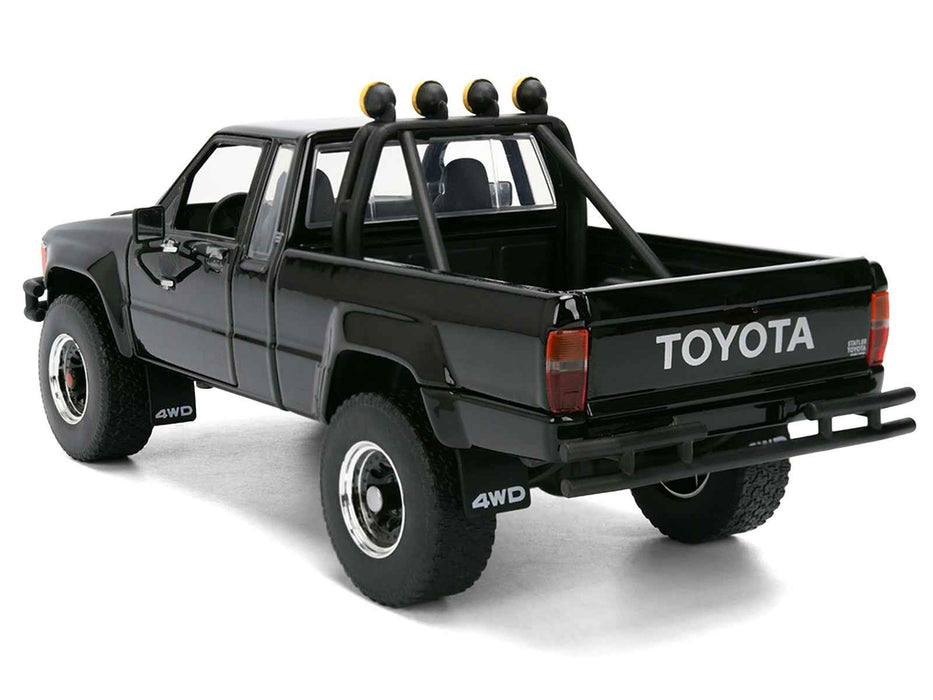1985 Toyota SR5 Pickup Truck Black with Marty's Skateboard "Back to the Future" (1985) Movie "Hollywood Rides" Series 1/24 Diecast Model Car by Jada