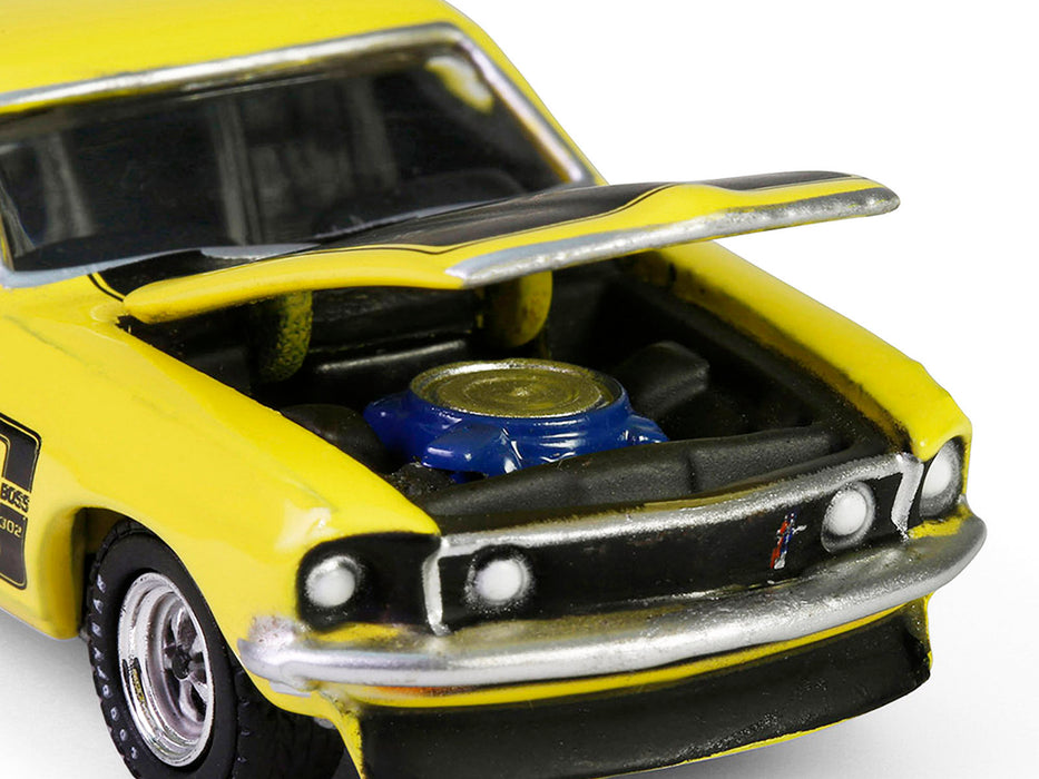 1969 Ford Mustang Boss 302 Bright Yellow with Black Hood and Stripes "Barrett-Jackson" Series 15 1/64 Diecast Model Car by Greenlight