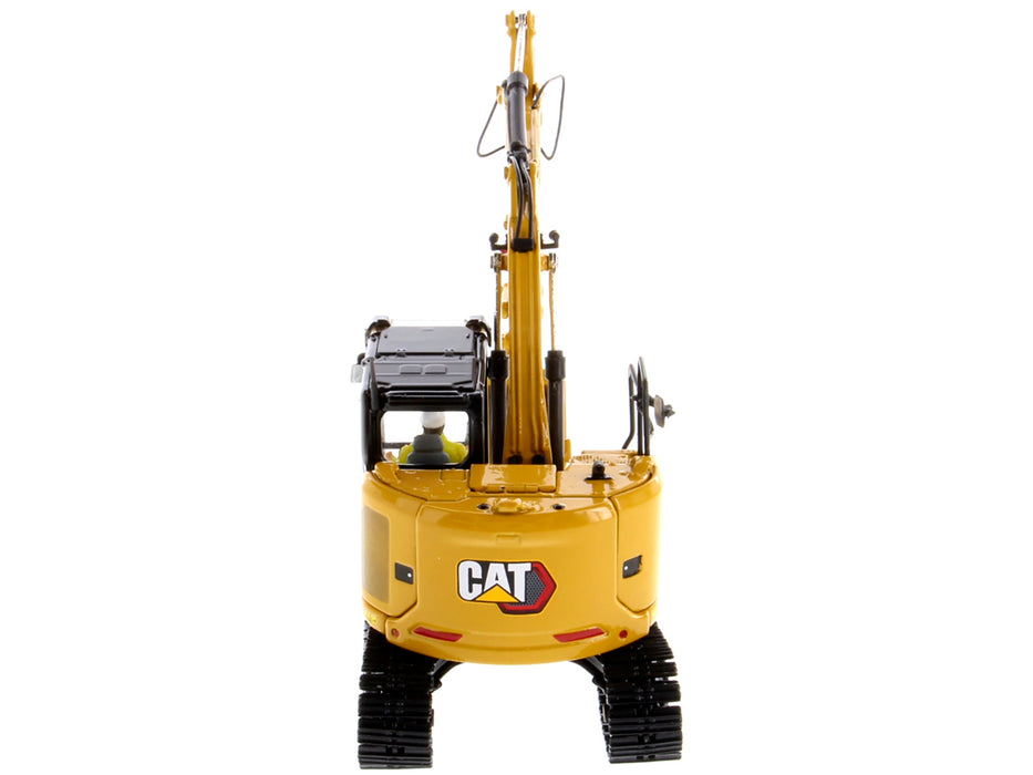 CAT Caterpillar 315 Track Type Hydraulic Excavator Yellow with Operator "High Line" Series 1/50 Diecast Model by Diecast Masters - Miniature Motors
