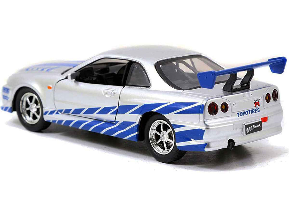 Brian's Nissan Skyline GT-R (R34) RHD (Right Hand Drive) Silver Metallic with Blue Stripes "2 Fast 2 Furious" (2003) Movie "Fast & Furious 25th Anniversary" Series 1/32 Diecast Car Model by Jada