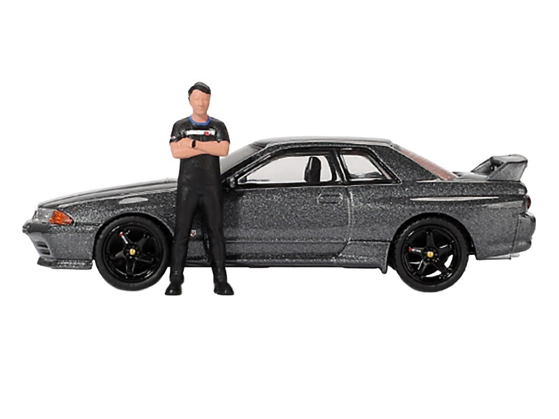 Nissan Skyline GT-R (R32) RHD (Right Hand Drive) Gunmetal Gray Metallic with Tsugio Matsuda Figure Limited Edition 1/64 Diecast Model Car by Mini GT