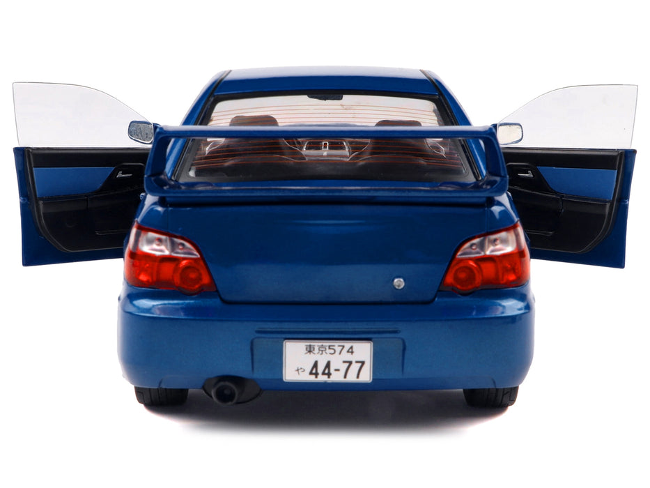 2003 Subaru Impreza WRX STI RHD (Right Hand Drive) Sonic Blue Metallic with Gold Wheels 1/18 Diecast Model Car by Solido