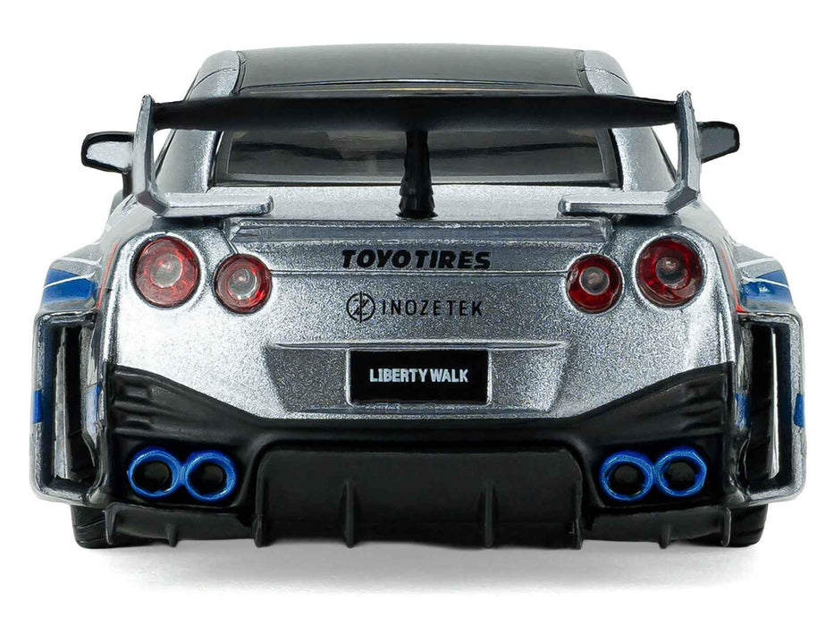 2020 Nissan GT-R (R35) Liberty Walk Silhouette RHD (Right Hand Drive) Silver Metallic with Black Top and Blue Graphics 1/43 Diecast Model Car by Solido