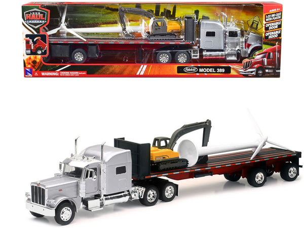 Peterbilt 389 Truck with Flatbed Trailer Silver Metallic with Excavator and Wind Turbine "Long Haul Truckers" Series 1/32 Diecast Model by New Ray - Miniature Motors