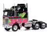 1976 Kenworth K100 Aerodyne Truck Tractor Black and Pink with Graphics 1/64 Diecast Model by IXO Models